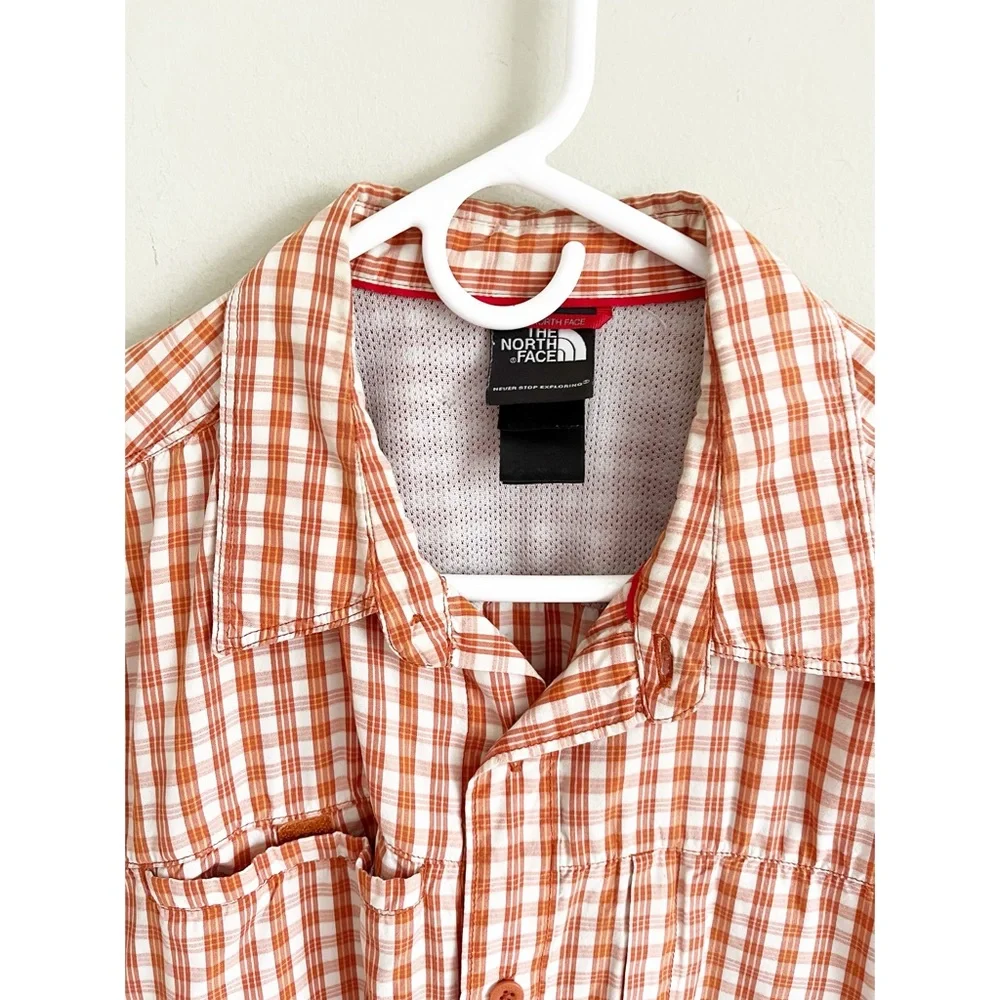 The North Face rust plaid short sleeve shirt L